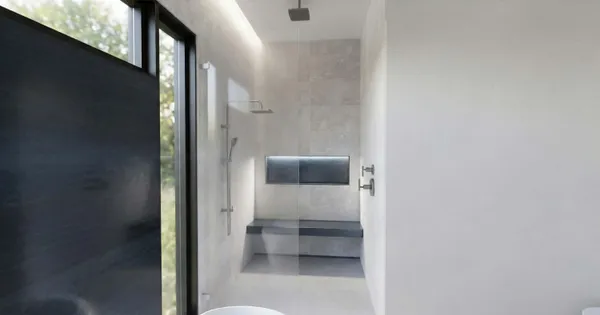 a bathroom with a toilet and a shower