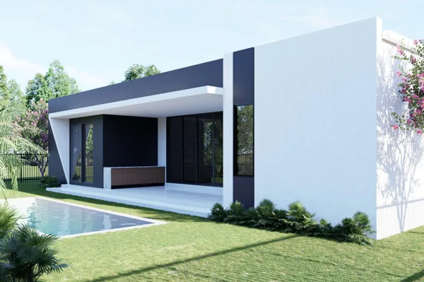 a view of house with backyard and tree