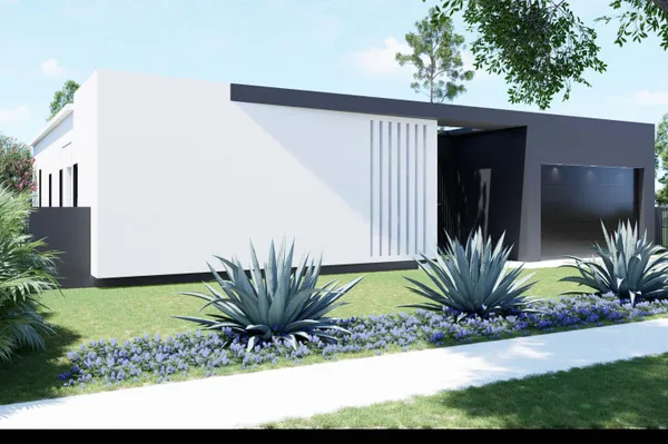 a view of a house with a backyard