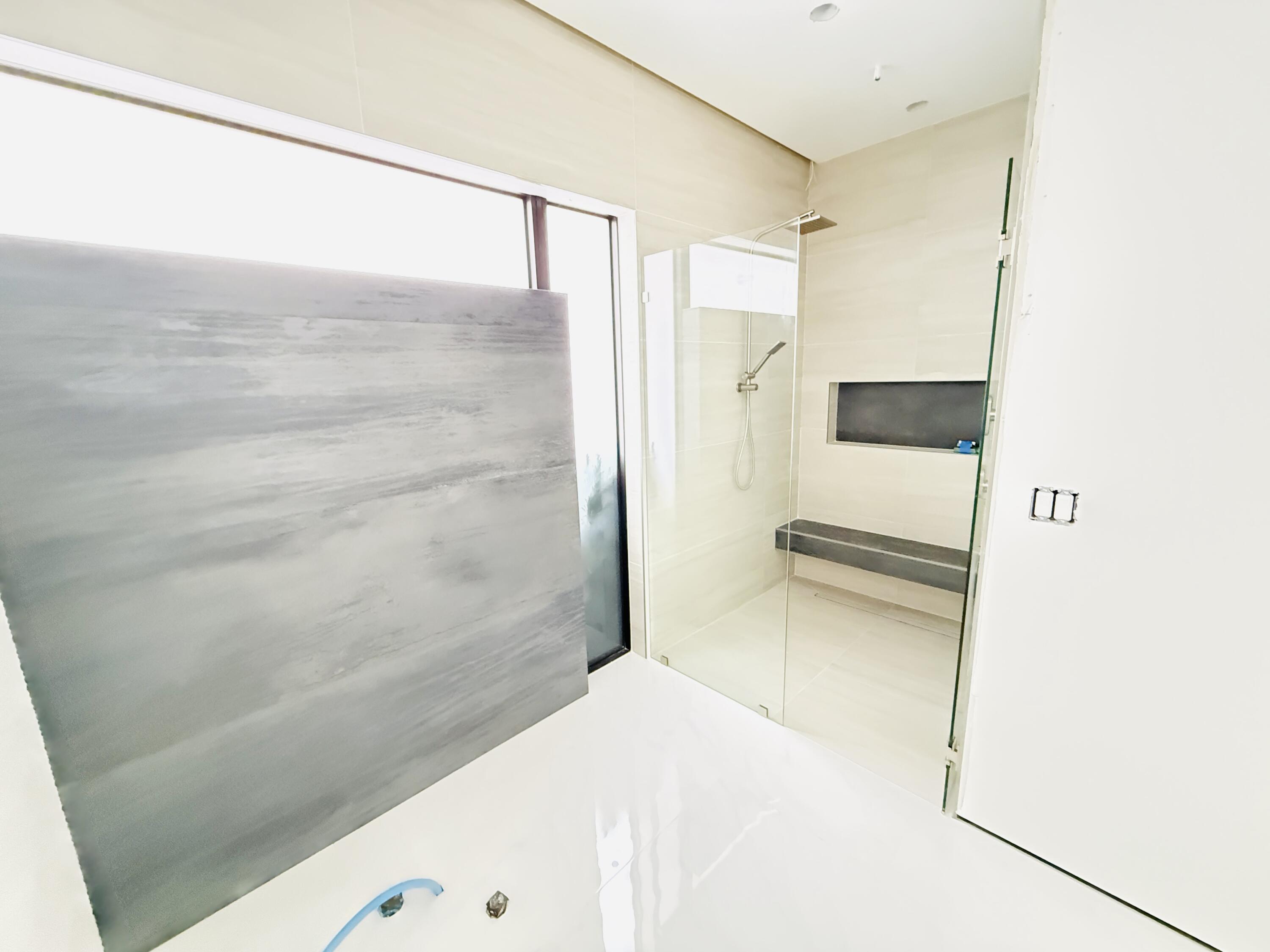 8966 Southwest 40th Terrace Miami, FL 33165 - Photo 23 of 40 a bathroom with a bathtub and a shower