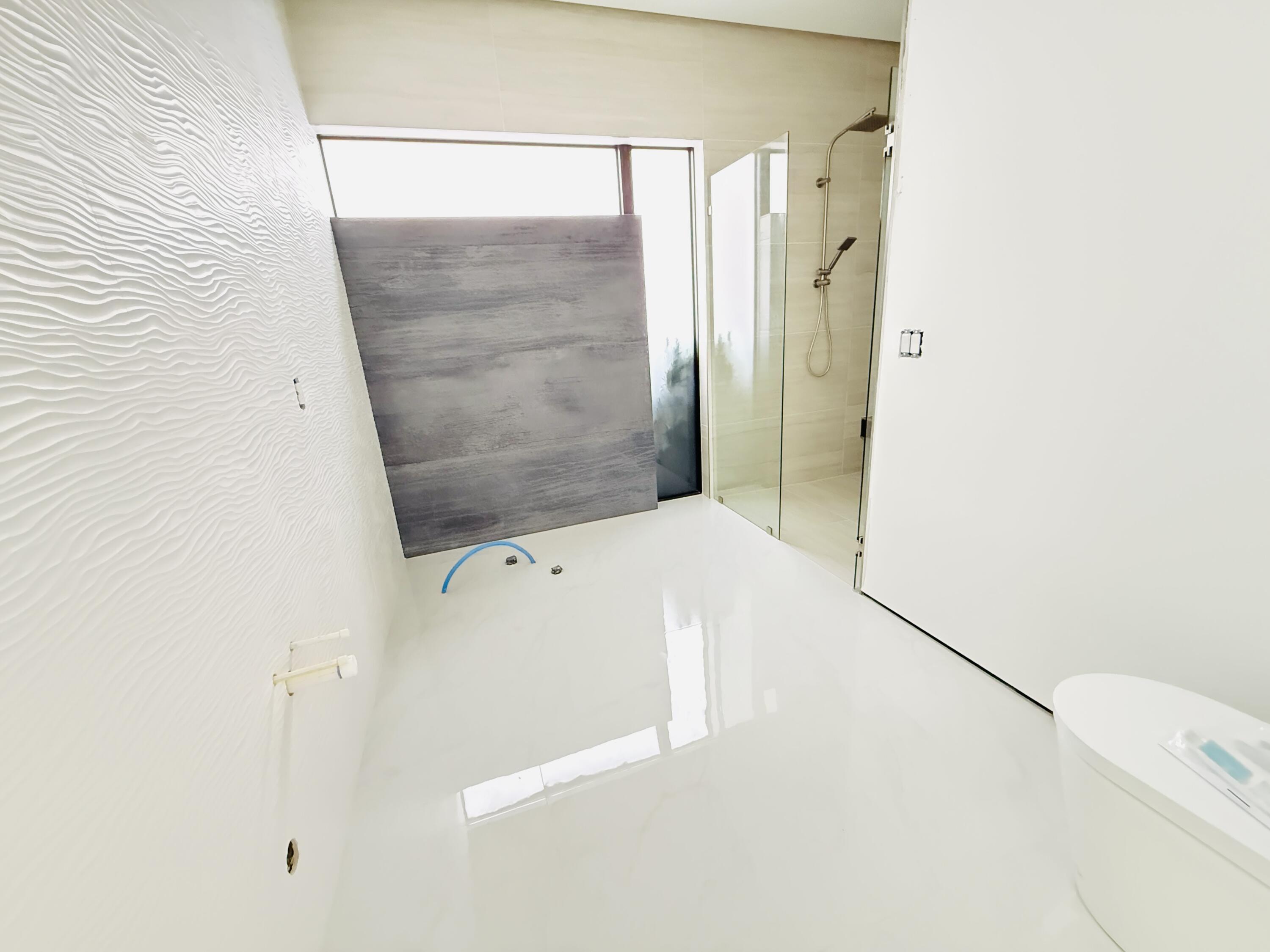 8966 Southwest 40th Terrace Miami, FL 33165 - Photo 24 of 40 a bathroom with a shower and a sink