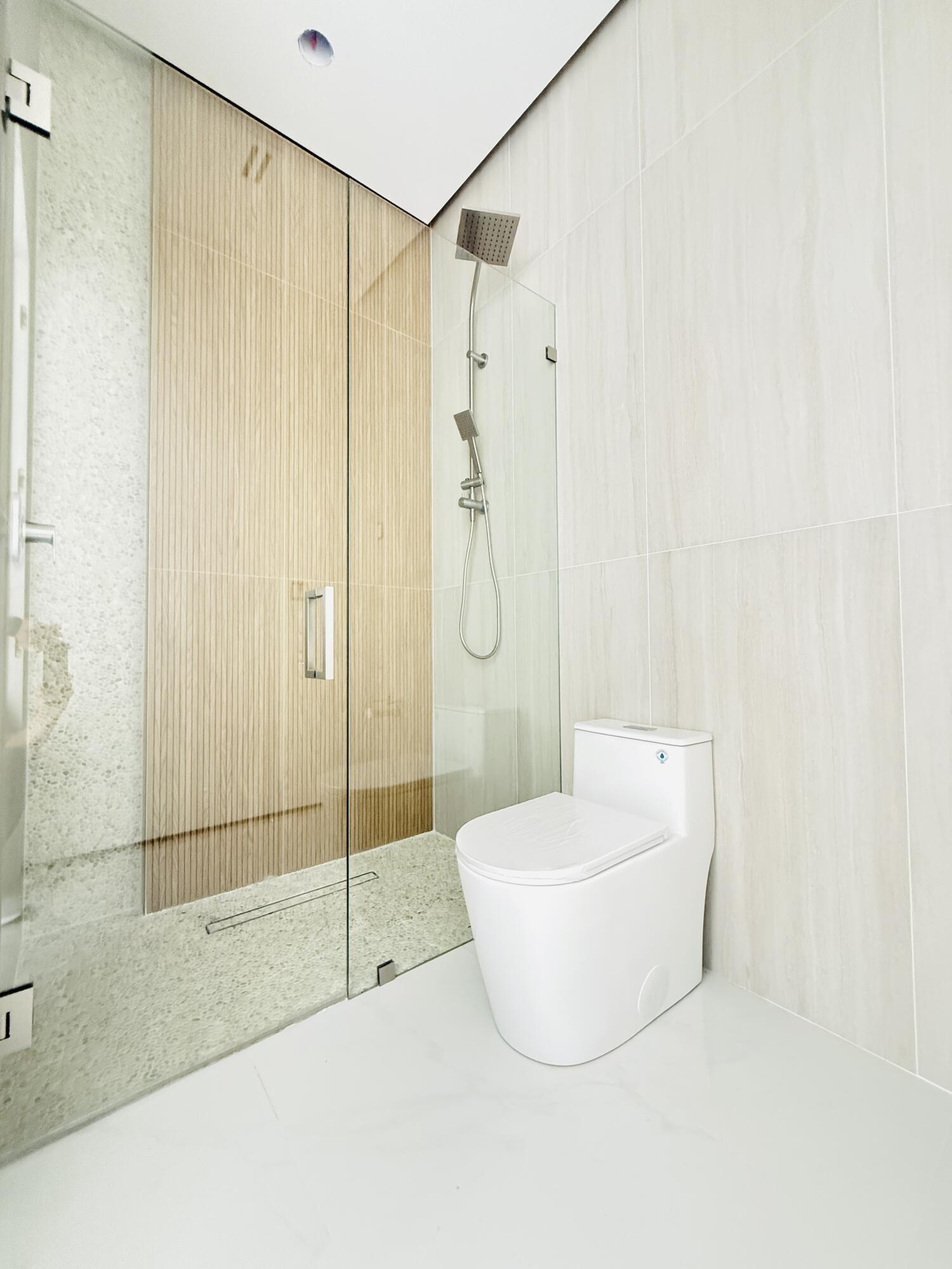 8966 Southwest 40th Terrace Miami, FL 33165 - Photo 28 of 40 a bathroom with a shower