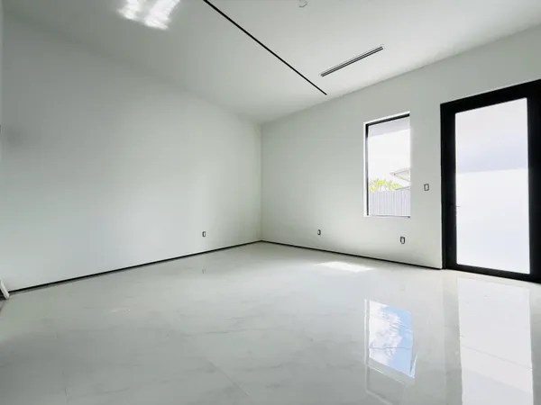 an empty room with windows