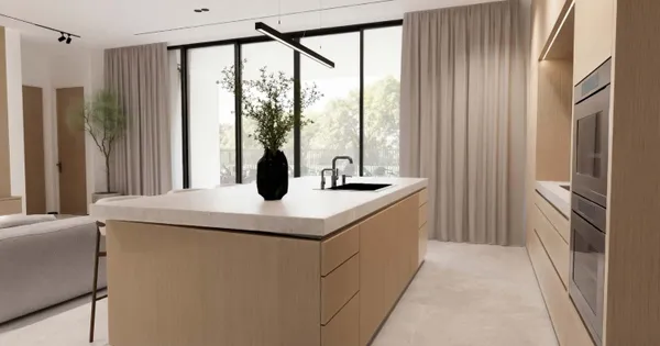 a kitchen with a sink and refrigerator