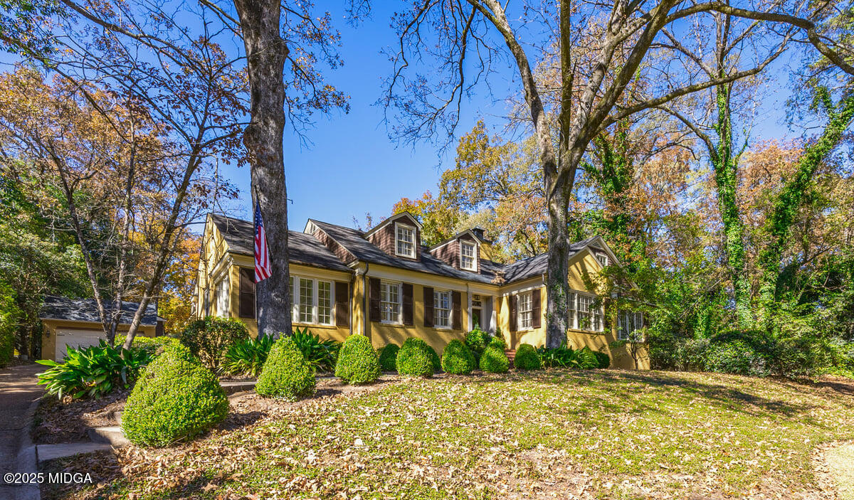 a view of a building with a garden