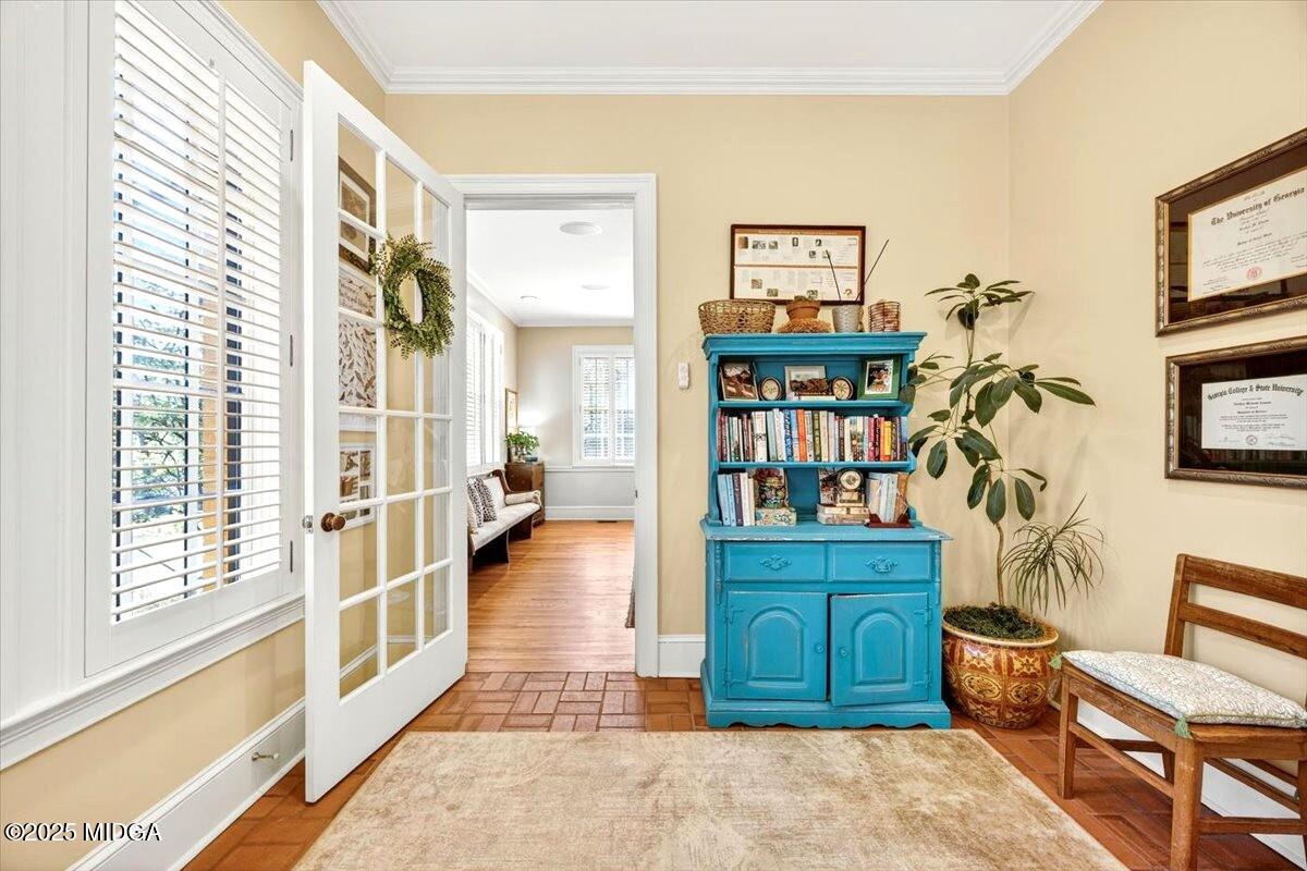 1158 Jackson Springs Road Macon, GA 31211 - Photo 11 of 42 a view of a hallway with workspace and a window