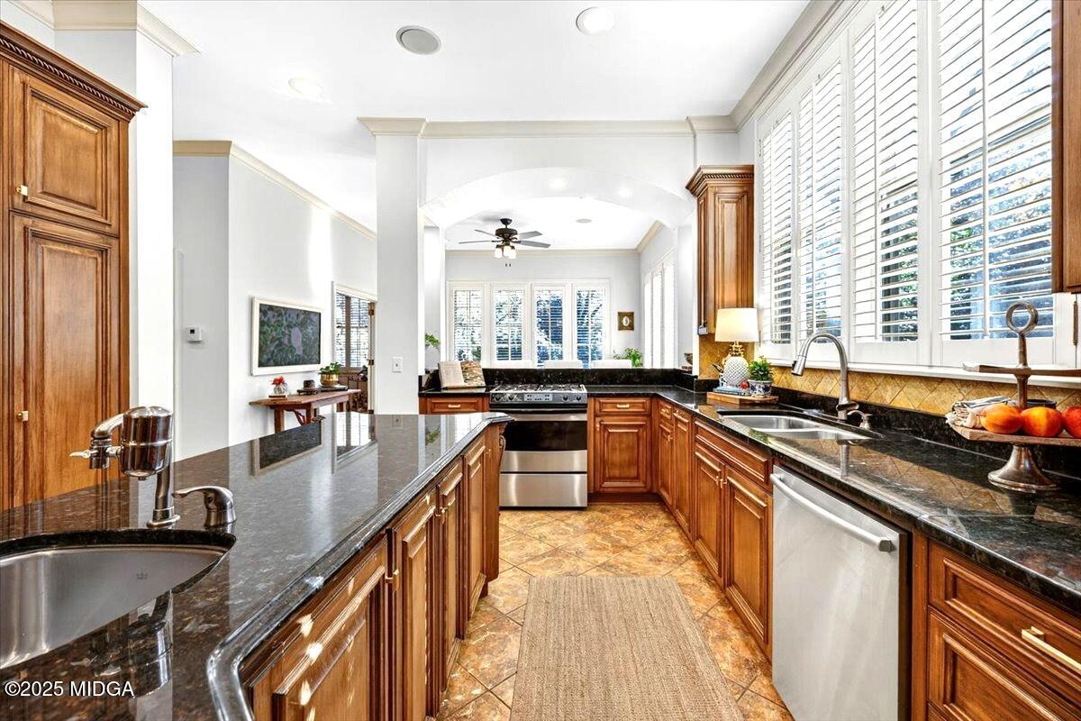 1158 Jackson Springs Road Macon, GA 31211 - Photo 13 of 42 a kitchen with counter top space a sink and appliances