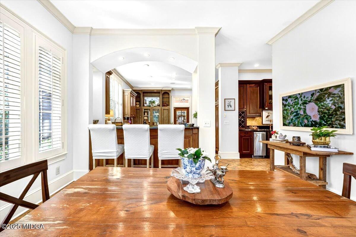 1158 Jackson Springs Road Macon, GA 31211 - Photo 17 of 42 a living room with furniture and a large window