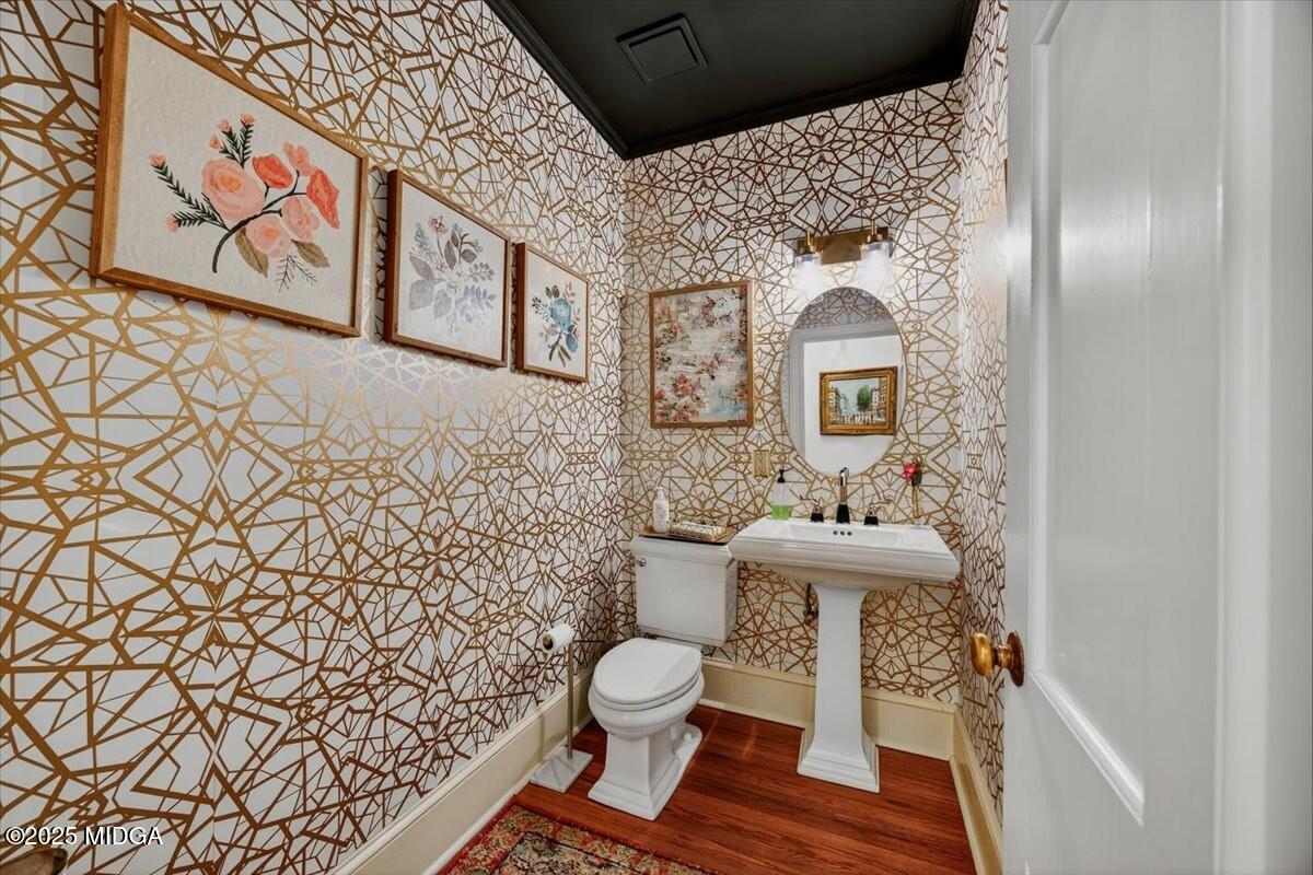 1158 Jackson Springs Road Macon, GA 31211 - Photo 20 of 42 a bathroom with a sink and a toilet