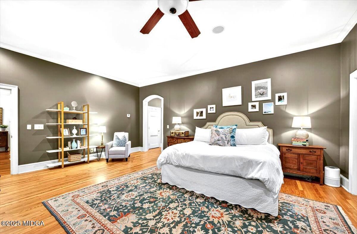 1158 Jackson Springs Road Macon, GA 31211 - Photo 21 of 42 a bedroom with a bed and wooden floor