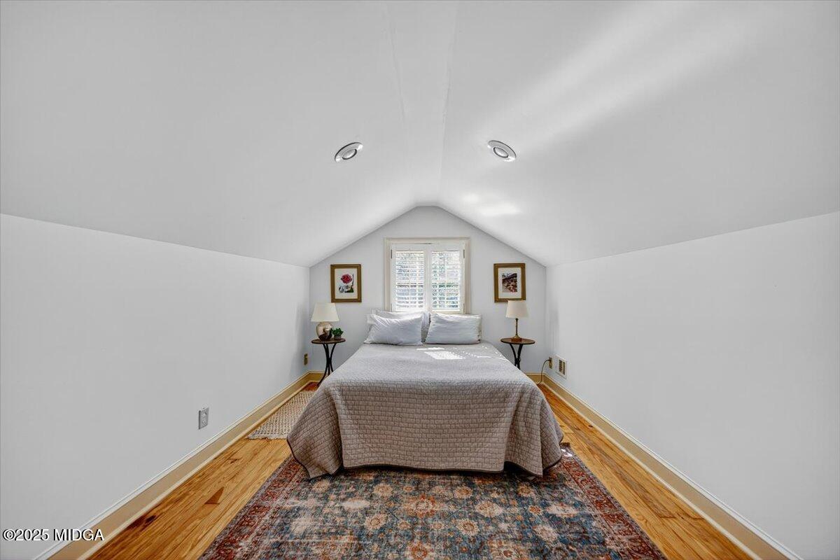 1158 Jackson Springs Road Macon, GA 31211 - Photo 35 of 42 a bedroom with a bed and a window