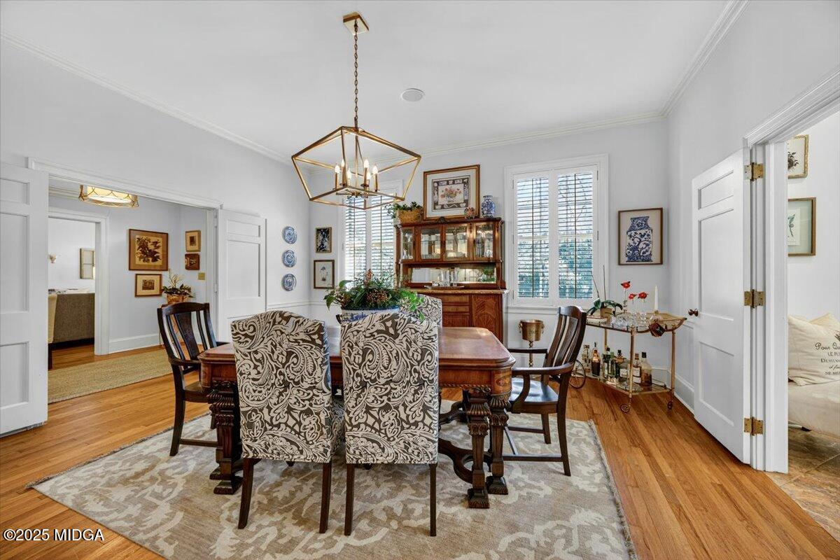 1158 Jackson Springs Road Macon, GA 31211 - Photo 5 of 42 a view of a dining room with furniture window and wooden floor