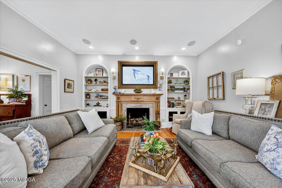 1158 Jackson Springs Road Macon, GA 31211 - Photo 7 of 42 a living room with furniture and a fireplace