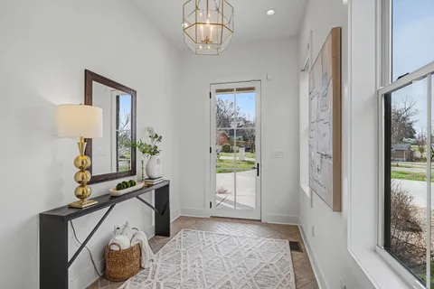 a view of room with window and hardwood floor