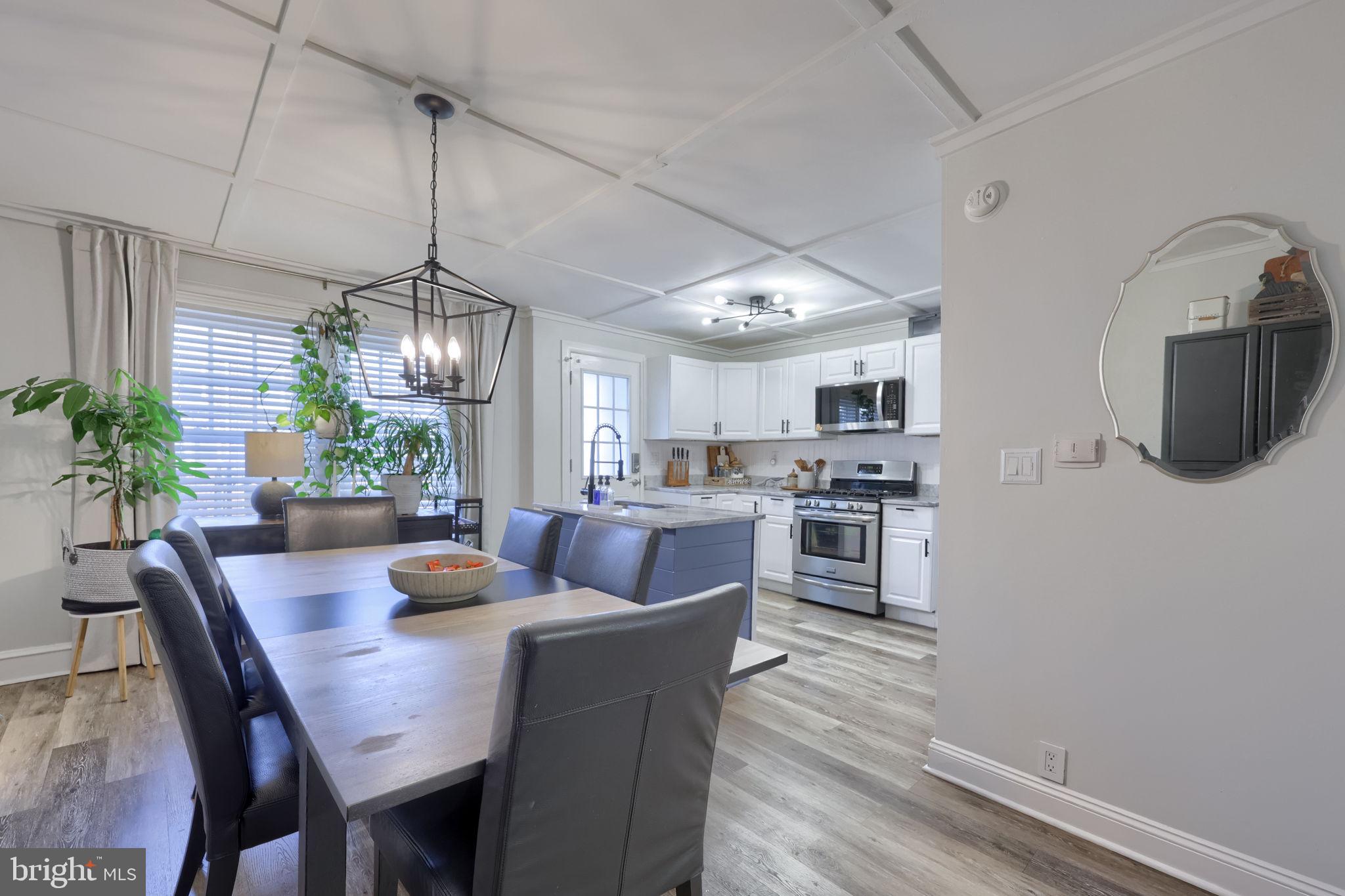 827 3rd Street Lancaster, PA 17603 - Photo 14 of 37 a view of a dining room with furniture window and wooden floor