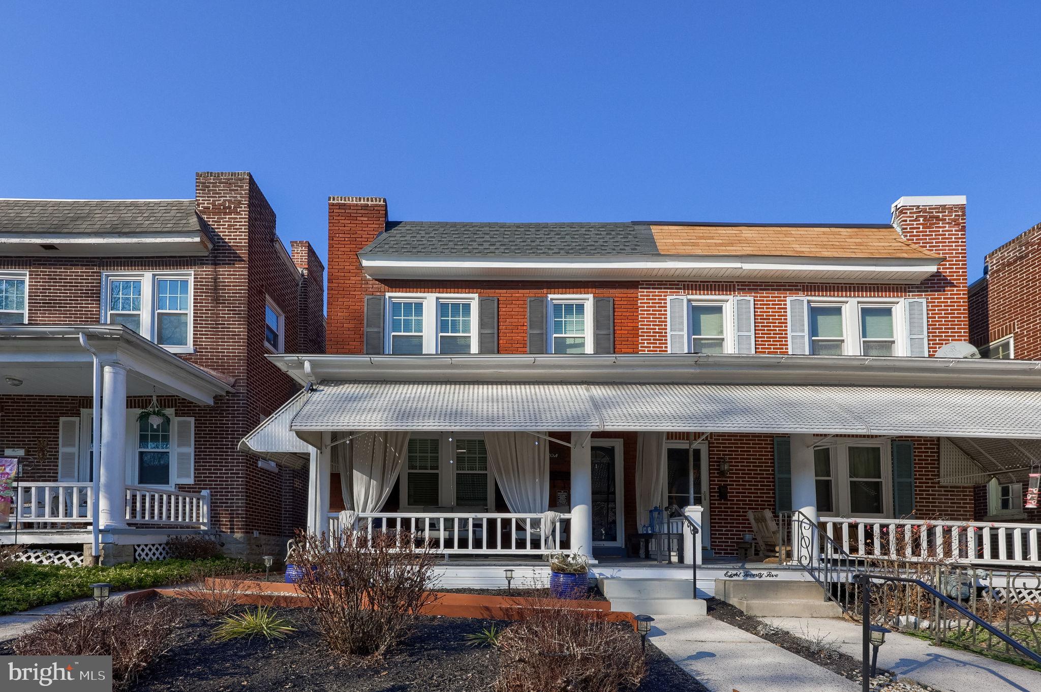 827 3rd Street Lancaster, PA 17603 - Photo 2 of 37 a front view of a house with a yard