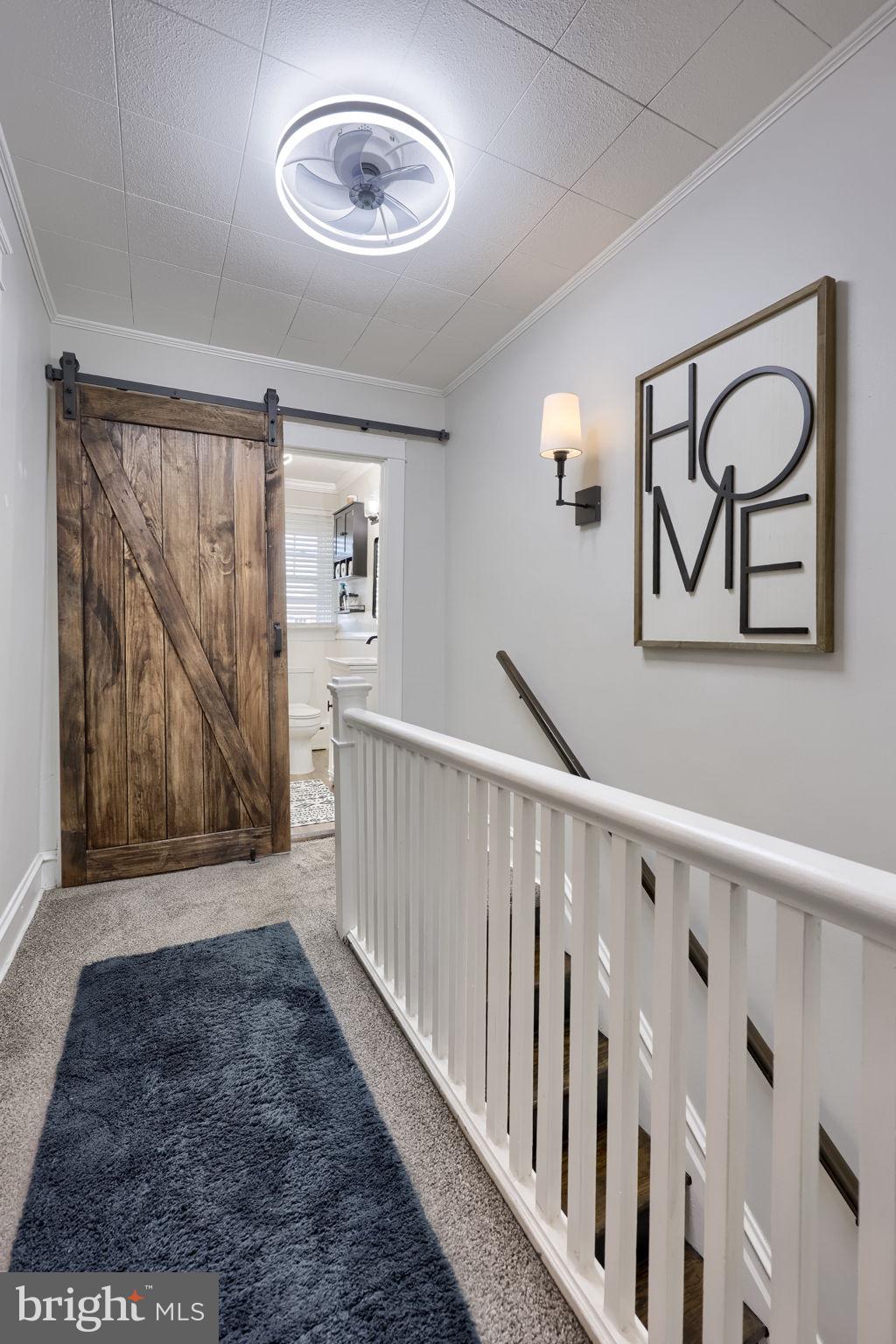 827 3rd Street Lancaster, PA 17603 - Photo 23 of 37 a view of a hallway with wooden floor