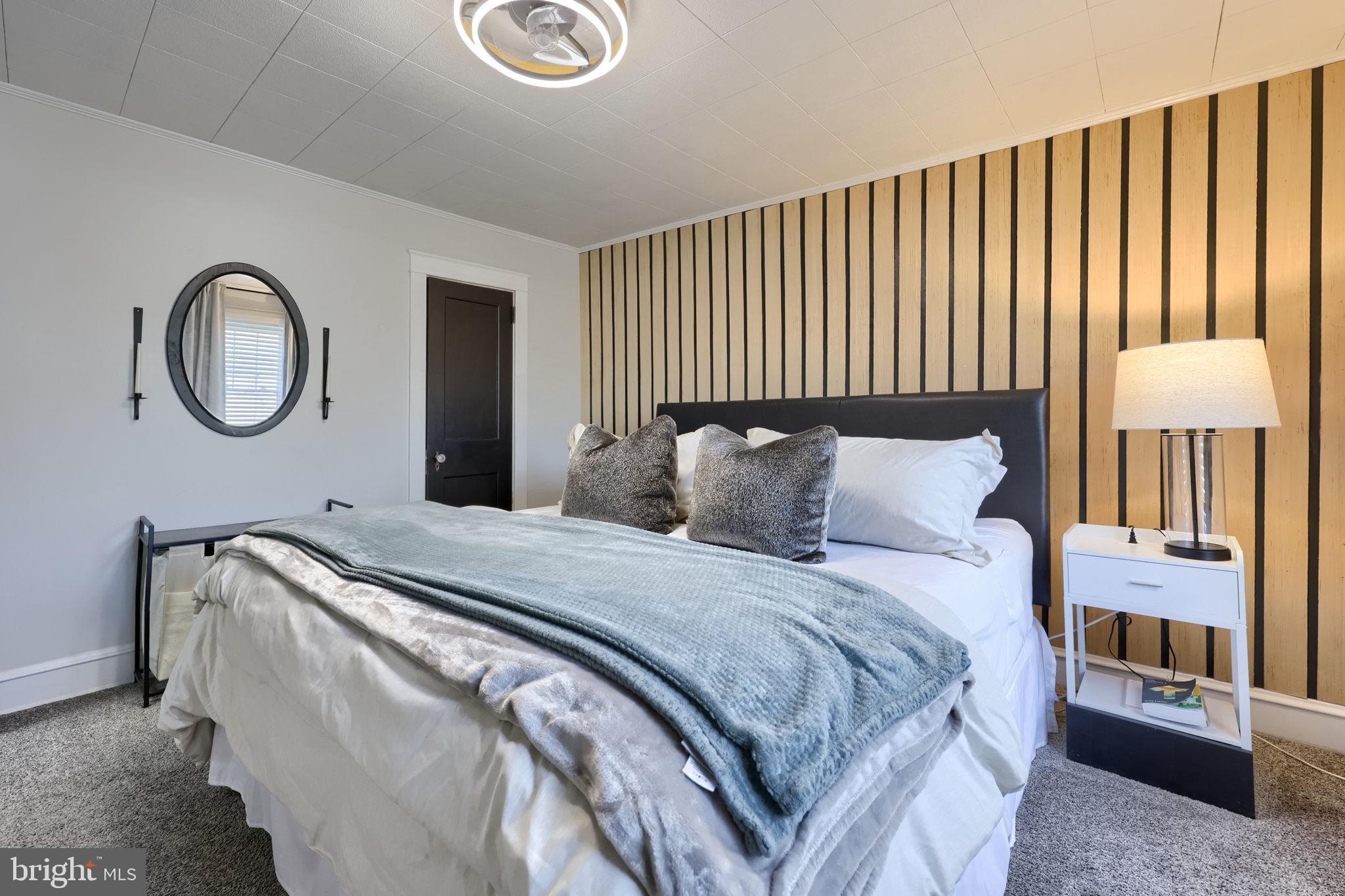 827 3rd Street Lancaster, PA 17603 - Photo 25 of 37 a bedroom with bed and a window