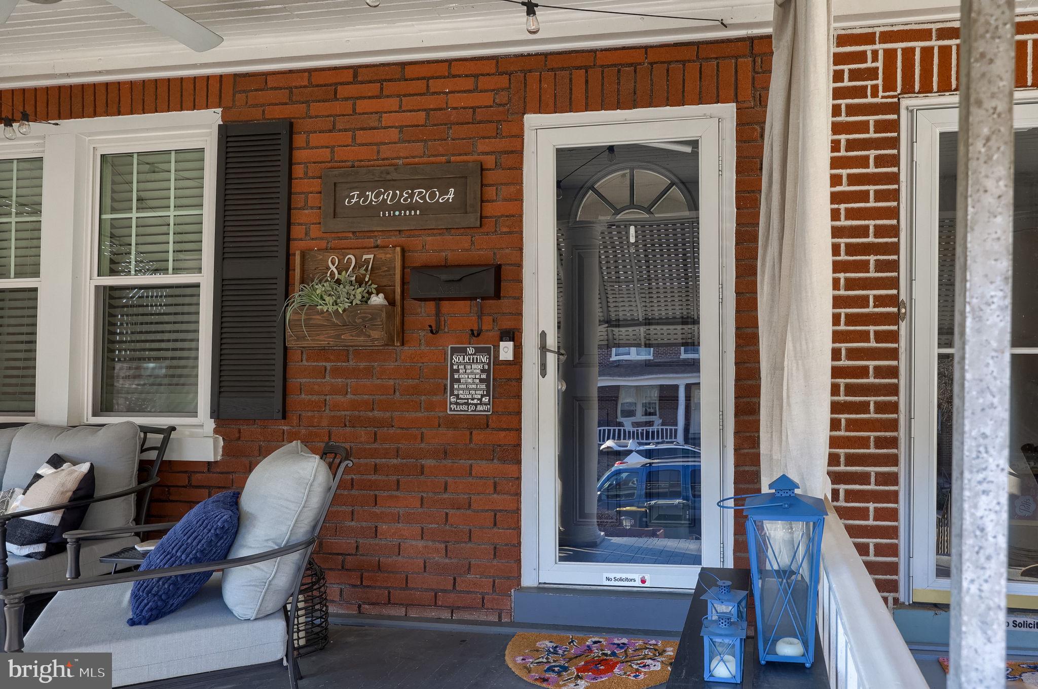 827 3rd Street Lancaster, PA 17603 - Photo 4 of 37 a front view of a house with outdoor seating