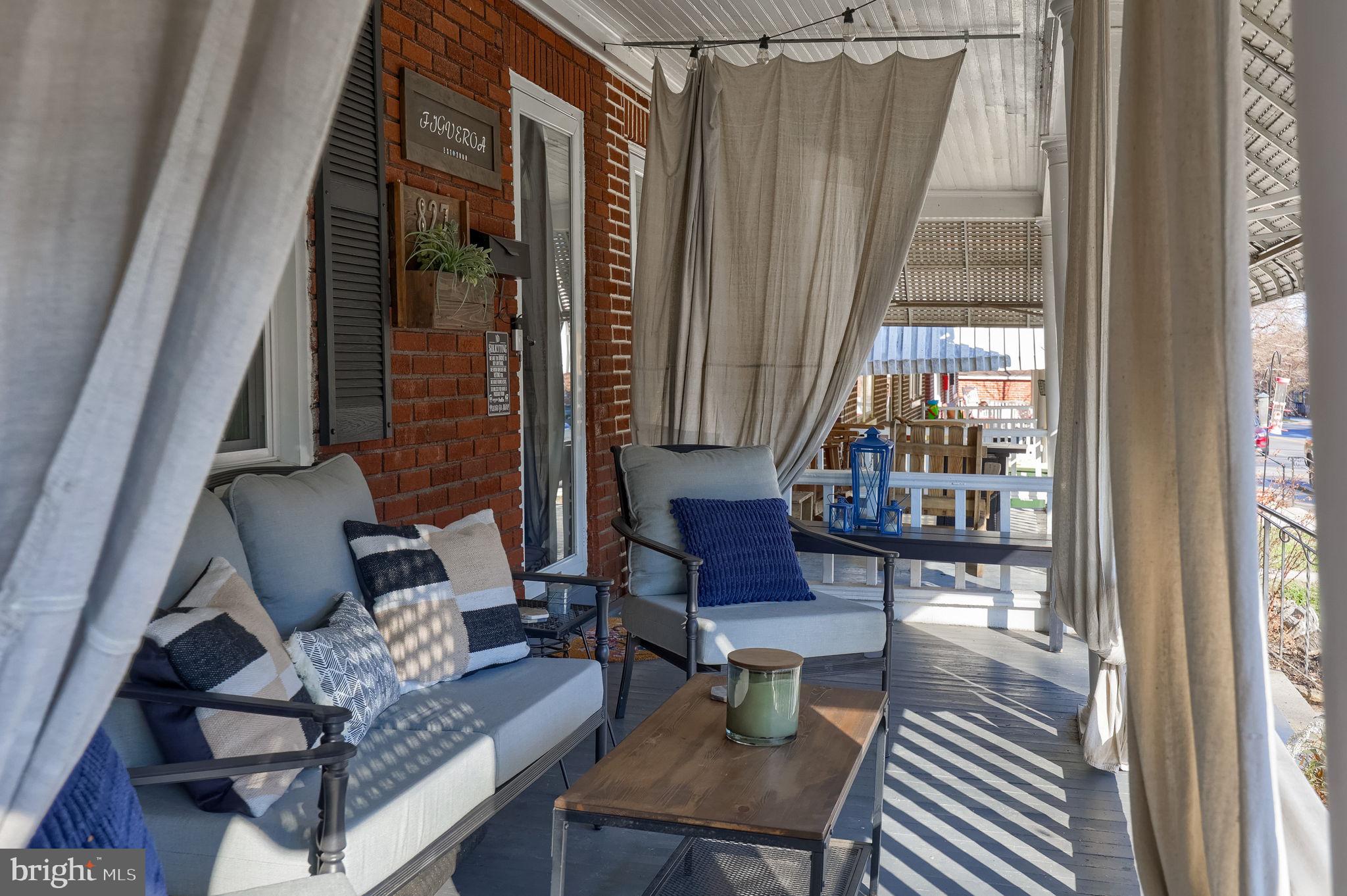 827 3rd Street Lancaster, PA 17603 - Photo 6 of 37 a living room with furniture and a window