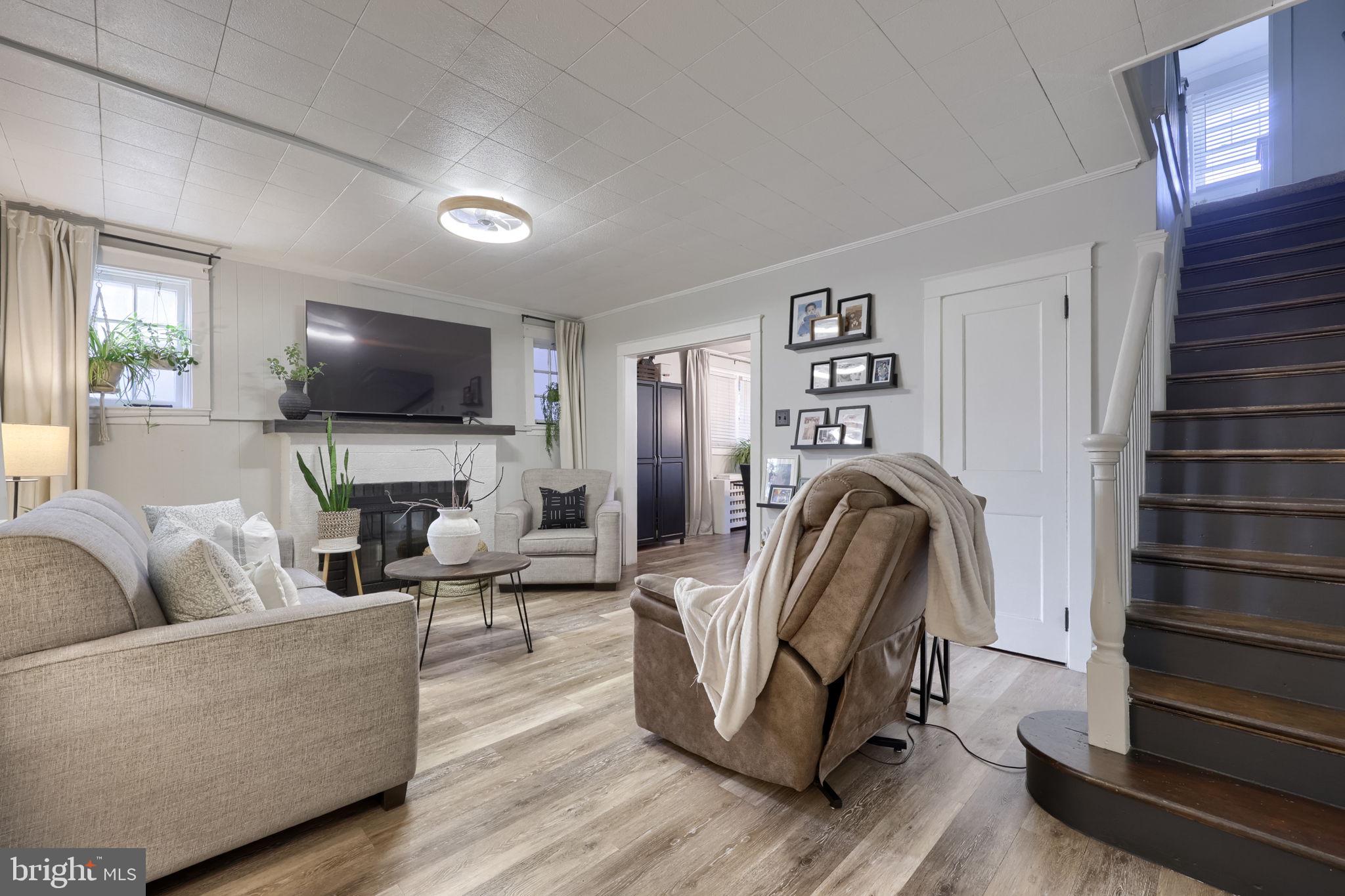 827 3rd Street Lancaster, PA 17603 - Photo 8 of 37 a living room with furniture and a flat screen tv