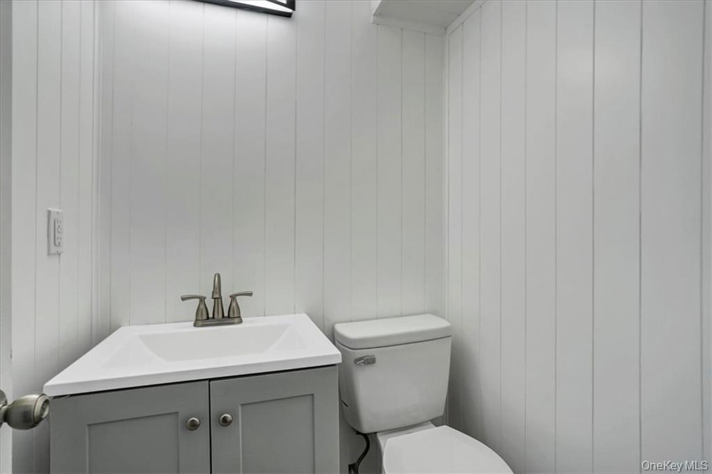 36 Ironworks Road Monroe, NY 10950 - Photo 21 of 37 Half bathroom featuring vanity and toilet