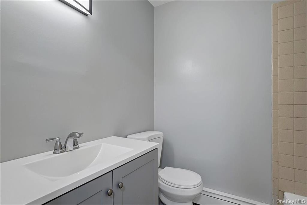 36 Ironworks Road Monroe, NY 10950 - Photo 30 of 37 Bathroom featuring vanity, a bathtub, and a shower