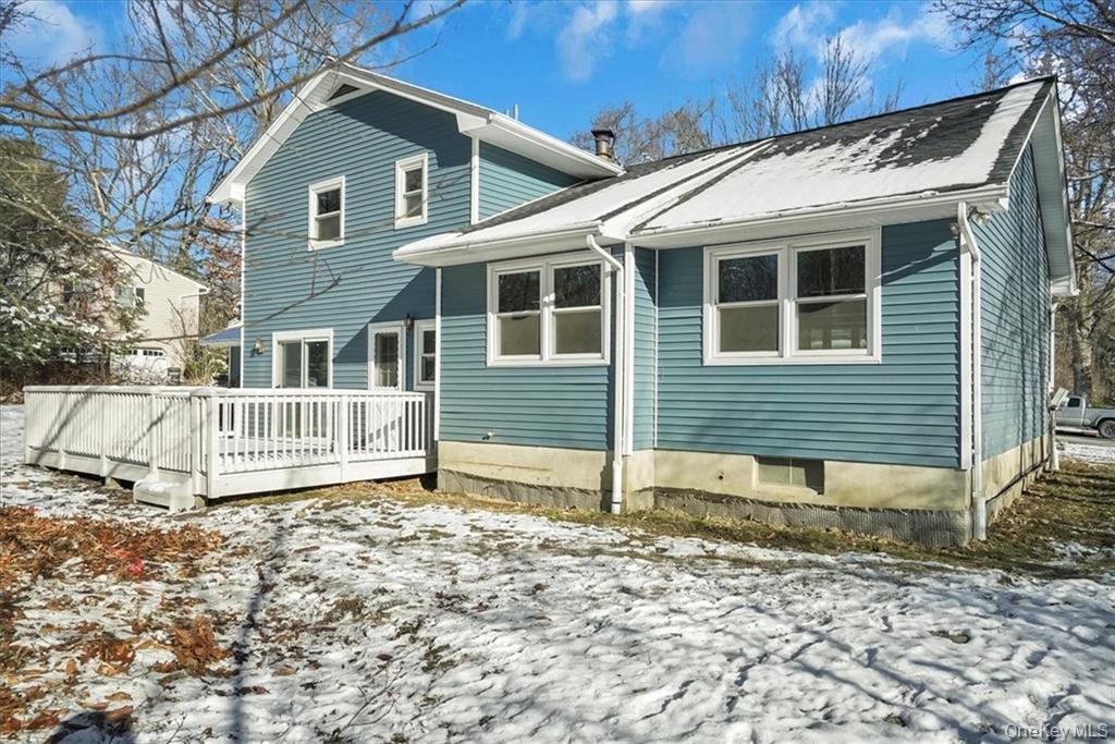 36 Ironworks Road Monroe, NY 10950 - Photo 34 of 37 Snow covered back of property with a wooden deck
