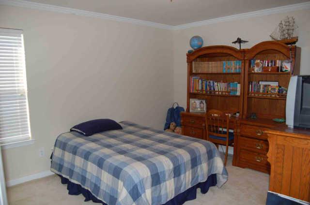 1510 Winter Court Spring Hill, TN 37174 - Photo 15 of 19 One of the smaller Bedroom upstairs and notice crown molding!
