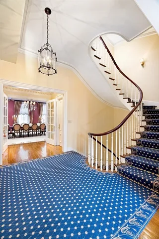 a view of entryway and hall with a bath tub