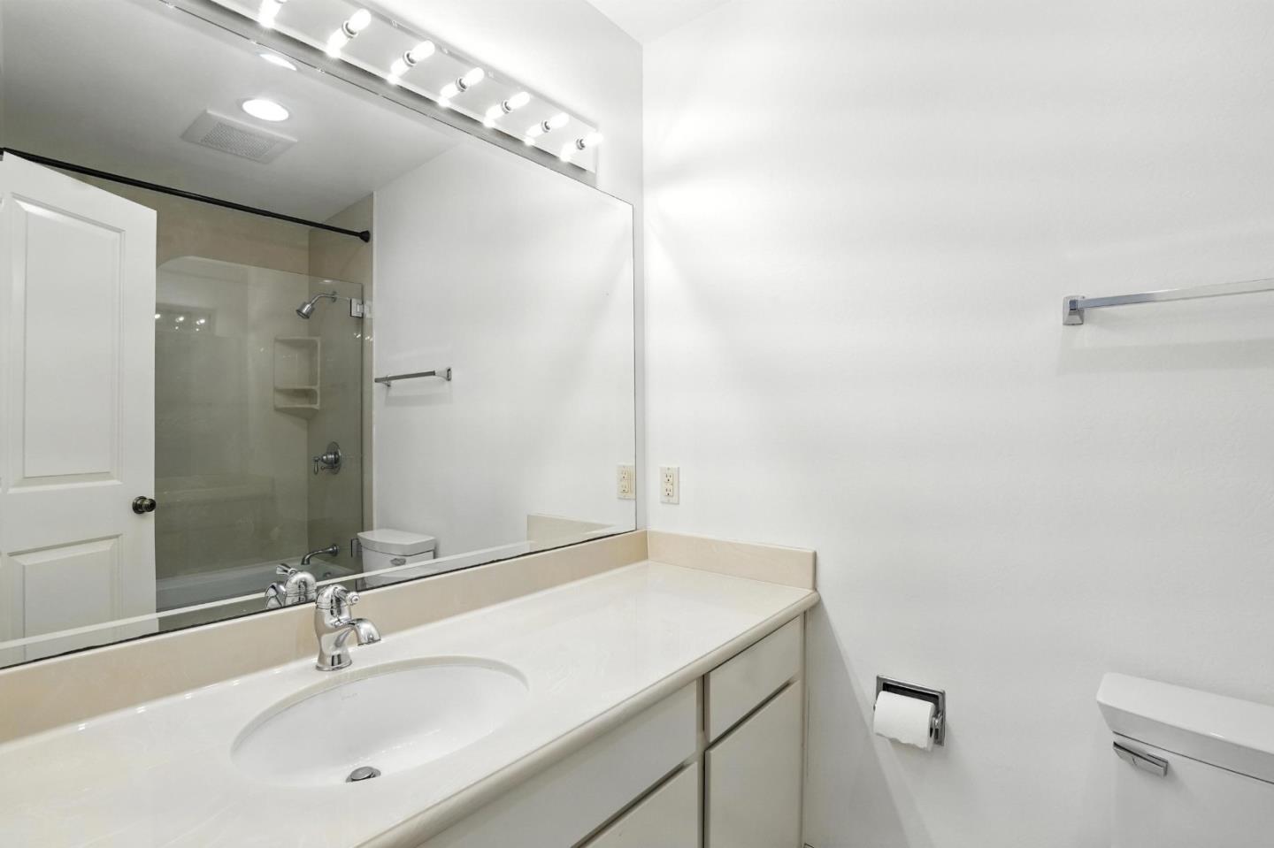 1171 Compass Lane, Unit 211 Foster City, CA 94404 - Photo 22 of 37 a bathroom with a sink and a mirror