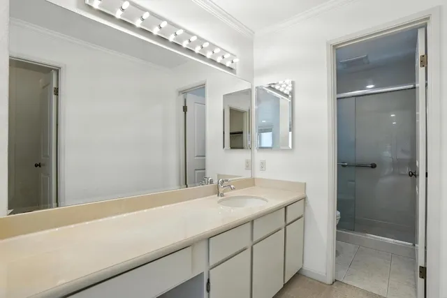 a bathroom with a shower and toilet