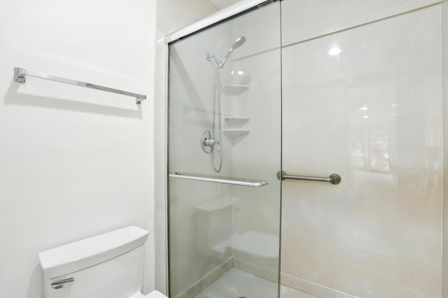 1171 Compass Lane, Unit 211 Foster City, CA 94404 - Photo 29 of 37 a bathroom with a shower and toilet