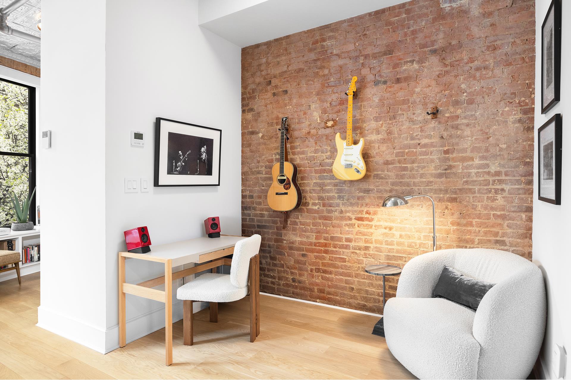 242 Lafayette Street, Unit 2N Manhattan, NY 10012 - Photo 5 of 13 a living room with furniture and wooden floor