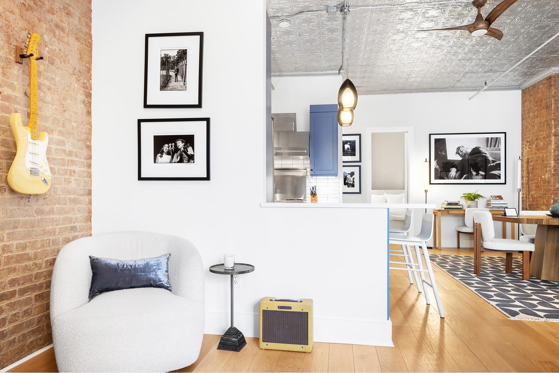 242 Lafayette Street, Unit 2N Manhattan, NY 10012 - Photo 6 of 13 a living room with furniture and wooden floor