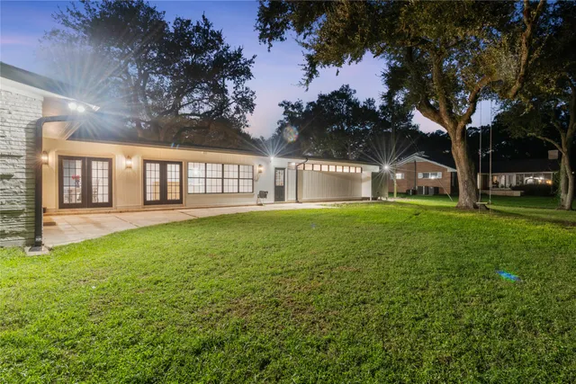a view of a house with a big yard