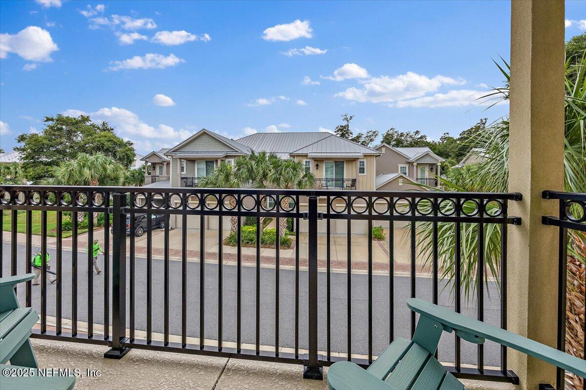 95220 Summerwoods Circle, Unit 1205 Fernandina Beach, FL 32034 - Photo 13 of 32 a view of a street from a balcony