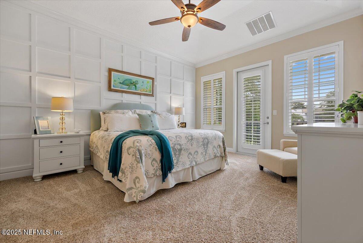95220 Summerwoods Circle, Unit 1205 Fernandina Beach, FL 32034 - Photo 20 of 32 a bed room with a bed and a window