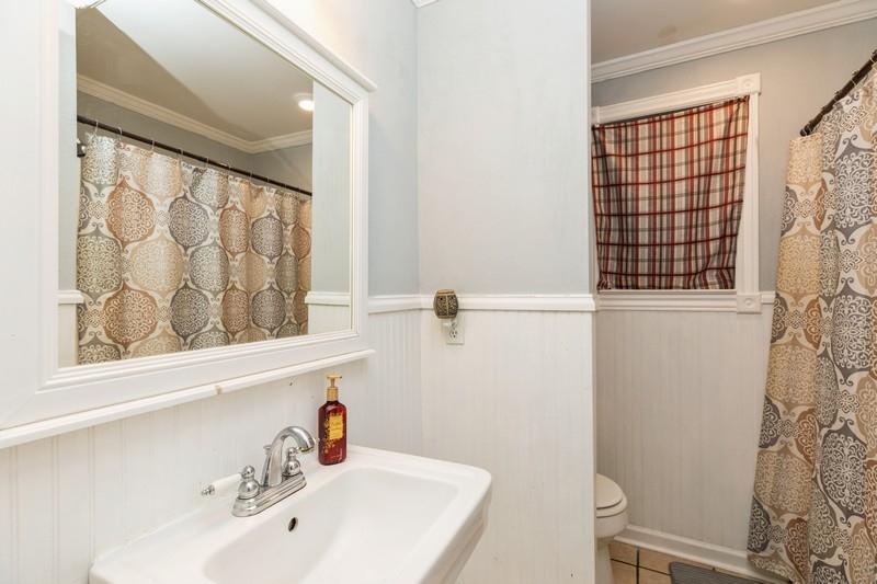 6124 Beasley Road Crestview, FL 32536 - Photo 18 of 20 a bathroom with a sink and a window