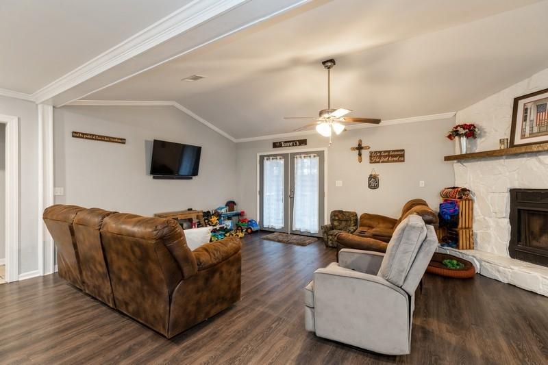 6124 Beasley Road Crestview, FL 32536 - Photo 4 of 20 a living room with furniture and a flat screen tv
