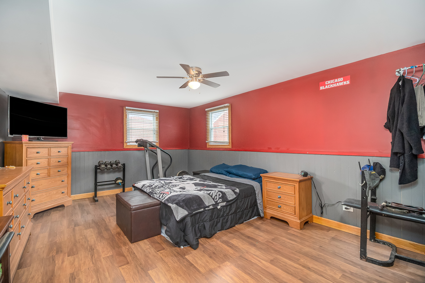 805 South Cooper Road New Lenox, IL 60451 - Photo 15 of 25 a bedroom with a bed and a flat screen tv