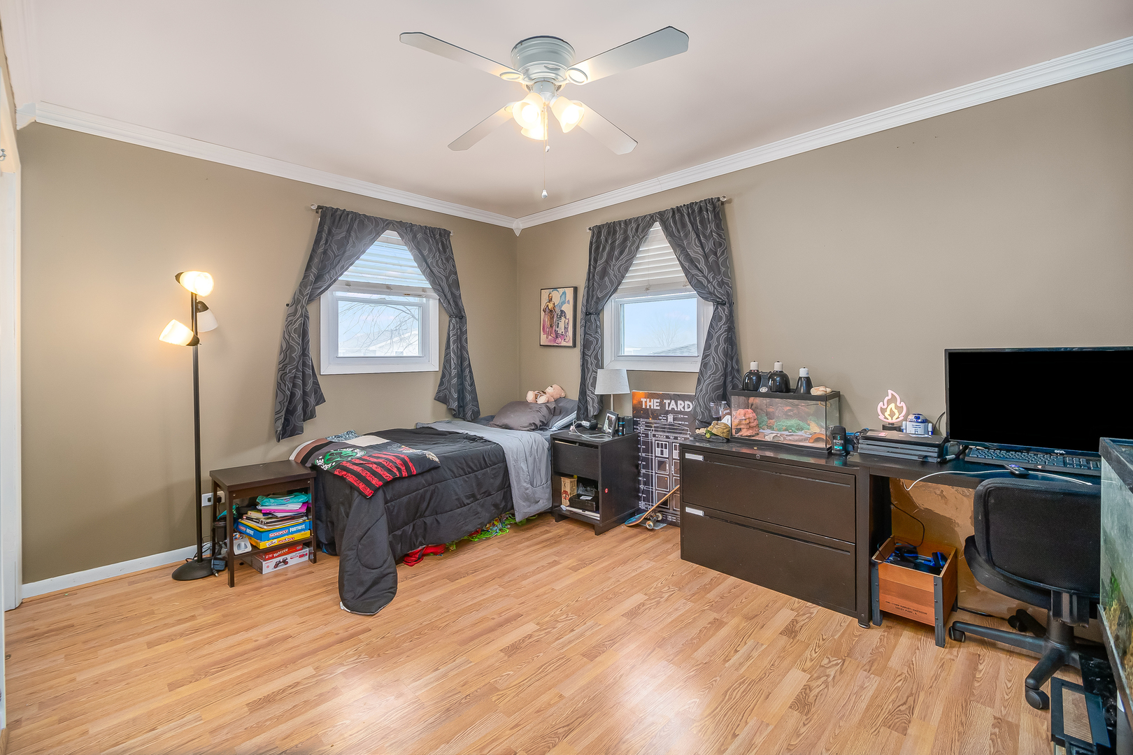 805 South Cooper Road New Lenox, IL 60451 - Photo 24 of 25 a living room with furniture and a flat screen tv
