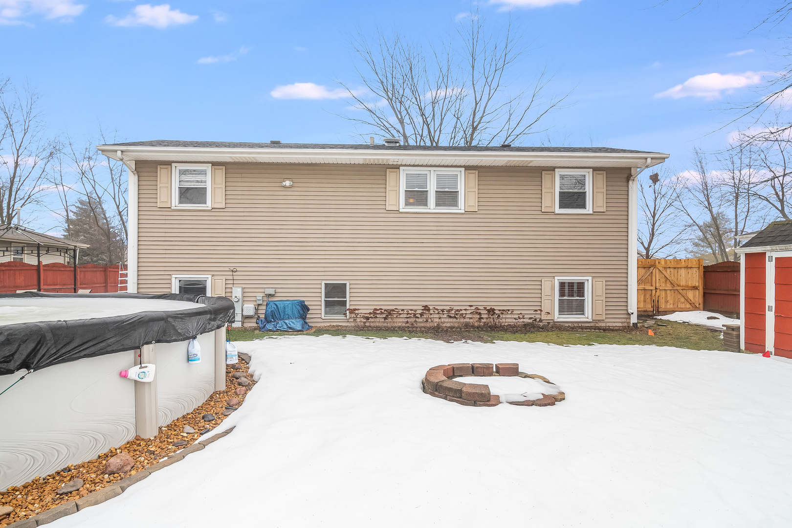 805 South Cooper Road New Lenox, IL 60451 - Photo 4 of 25 a swimming pool with outdoor seating and yard