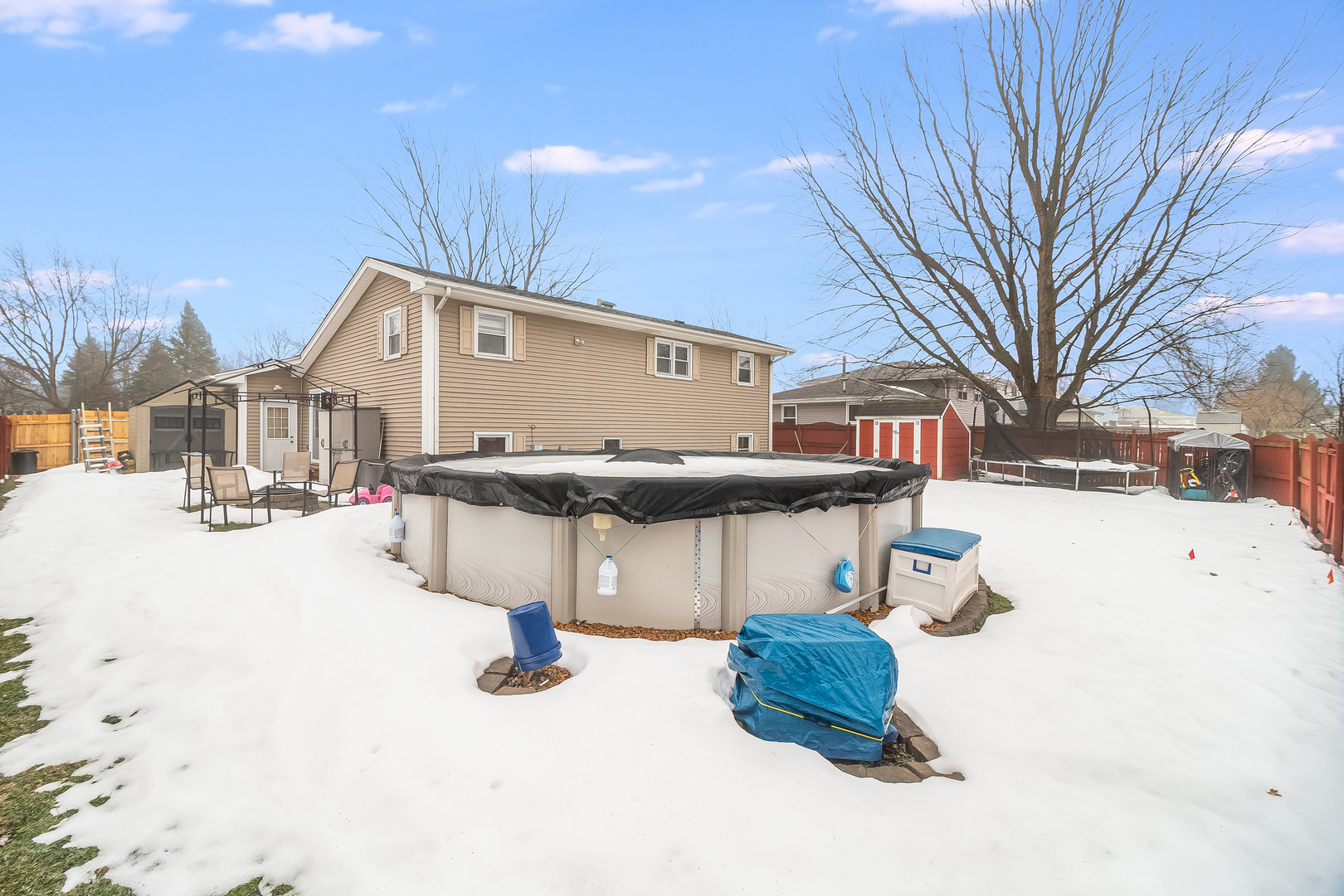 805 South Cooper Road New Lenox, IL 60451 - Photo 5 of 25 a view of a house with snow on the road