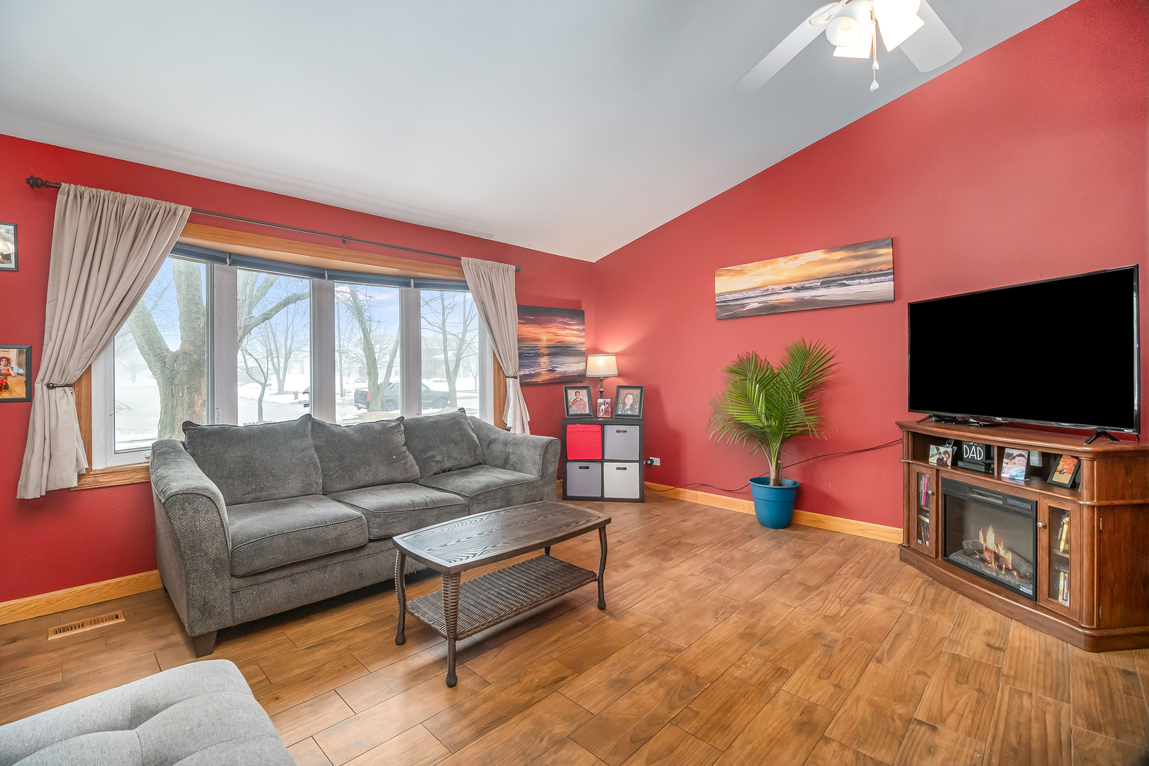 805 South Cooper Road New Lenox, IL 60451 - Photo 10 of 25 a living room with furniture and a flat screen tv