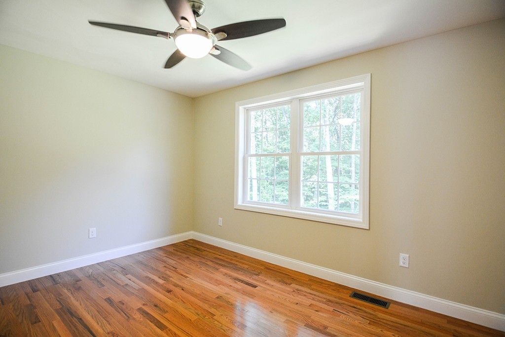 Lot 3 Tavern Road Groton, MA 01450 - Photo 17 of 25 wooden floor in an empty room with a window