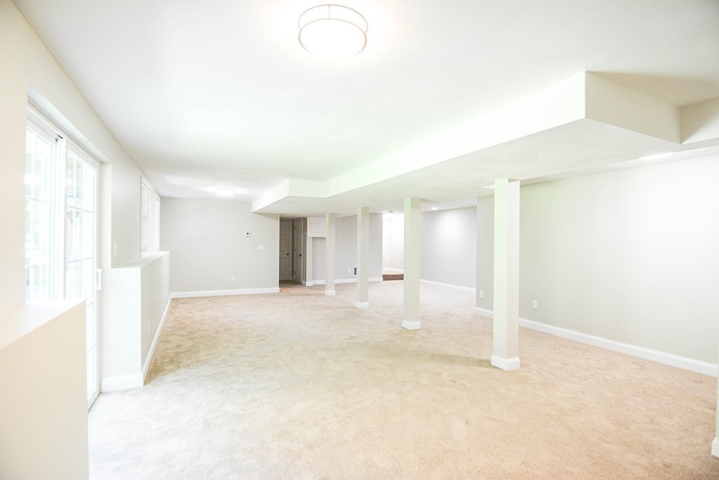 Lot 3 Tavern Road Groton, MA 01450 - Photo 19 of 25 a view of a livingroom with wooden floor and window