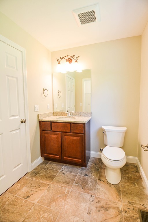 Lot 3 Tavern Road Groton, MA 01450 - Photo 10 of 25 a bathroom with a toilet sink and mirror