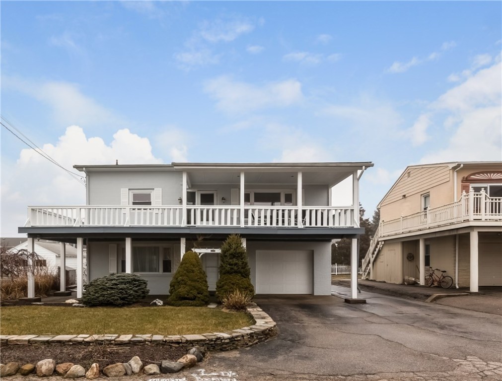 26 Dunes Road Narragansett, RI 02882 - Photo 5 of 40 LASTING MEMORIES CREATED AT THIS OCEAN SIDE OASIS! OCEAN VIEWS FROM FIRST AND SECOND FLOOR. A STONES THROW TO KELLY BEACH WITH ACCESS DIRECTLY ACROSS THE STREET!