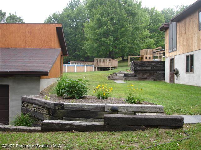 117 Elk Lake Road Springville, PA 18844 - Photo 14 of 15 a view of house with outdoor space